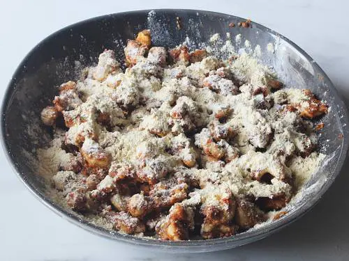 adding more flour as needed to make roasted cashews