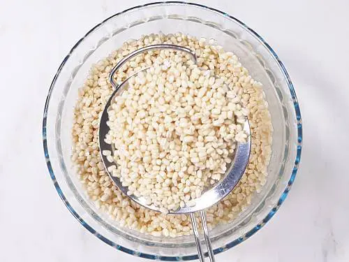 draining water from soaked urad dal