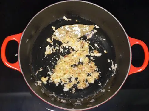 frying ginger garlic paste to make paneer lababdar gravy