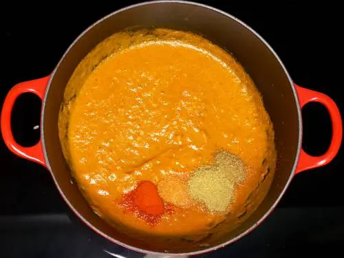 add spice powders to the tomato masala