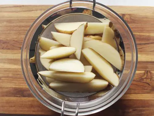 drained potatoes in a colander