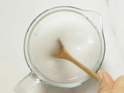 mixing cornstarch or arrowroot powder with water