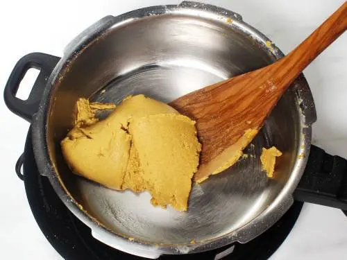 frying gram flour on a low heat