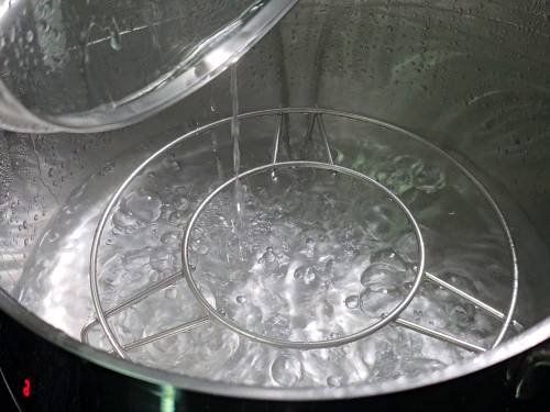 water boiling in a steamer
