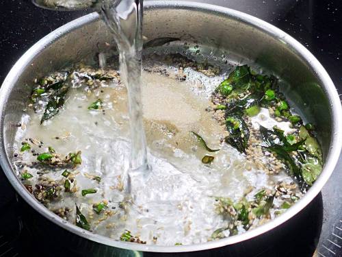 adding sugar, salt and water