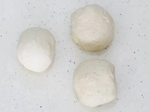 how to learn to make pizza knead the dough and shape to balls