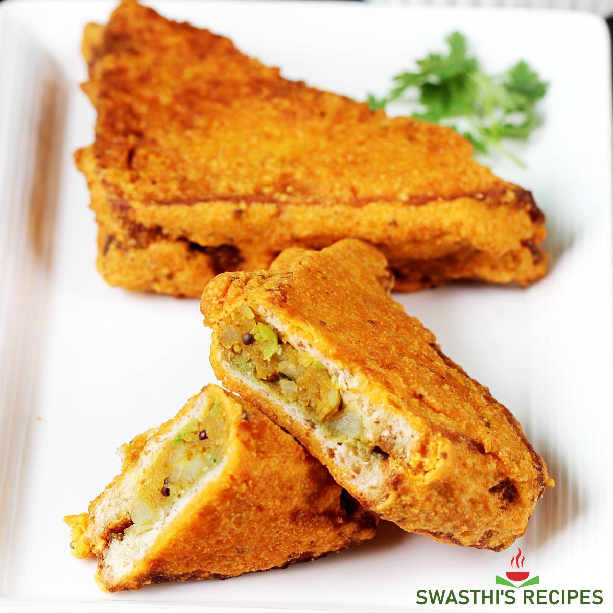 bread pakora ready to serve in a white plate