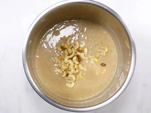 javvarisi payasam made in instant pot, topped with nuts and raisins