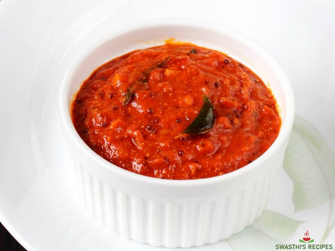 spicy tomato chutney in a white bowl