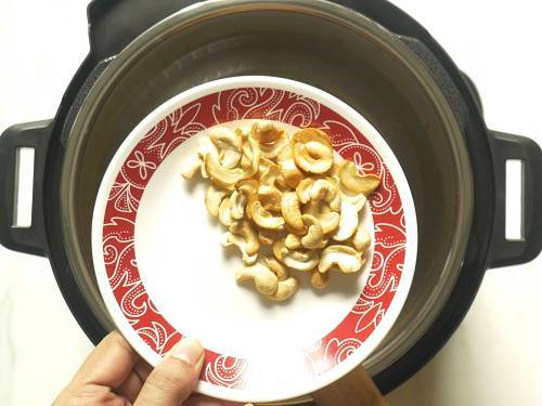 fried cashew nuts in a plate