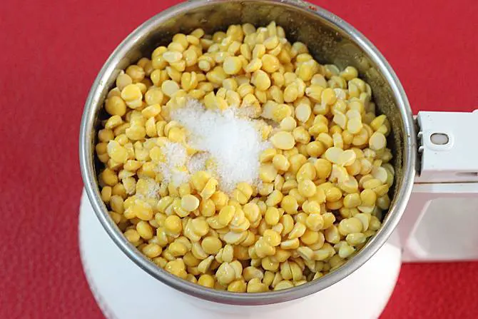 chana dal and salt in a grinder