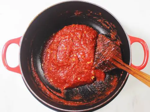 thickened tomato sauce in a pan