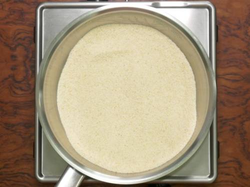 roasting rava in a pan