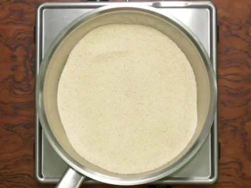 roasting rava in a pan