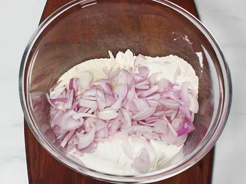 chopped onions in a mixing bowl