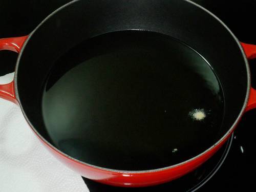heat oil in a deep pan to fry