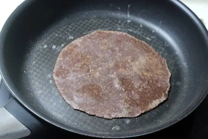 ragi roti on a tawa