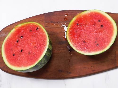 cut watermelon on a chopping board