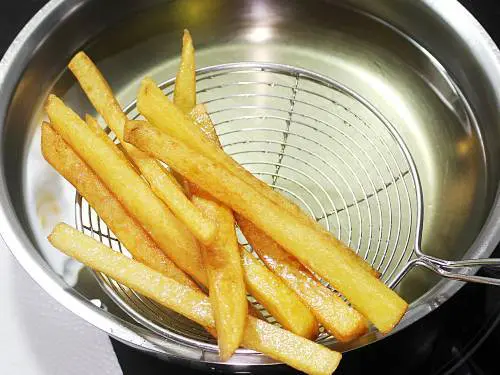 remove french fries from oil