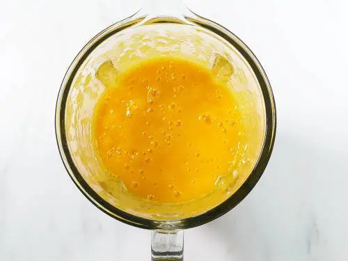 smooth mango juice in a blender