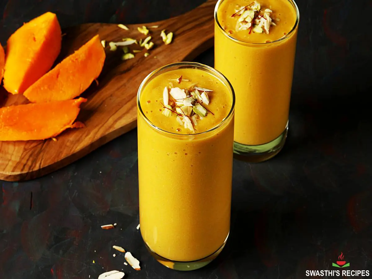 mango milkshake in a serving glass