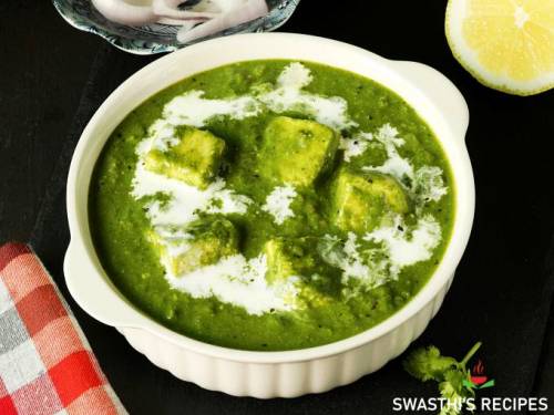 palak paneer in a white bowl