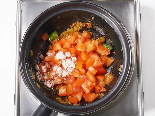 tomatoes and salt in a pan