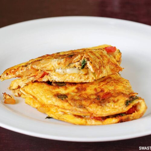 https://www.indianhealthyrecipes.com/wp-content/uploads/2021/06/cheese-omelette-mozarella-omelette-500x500.jpg