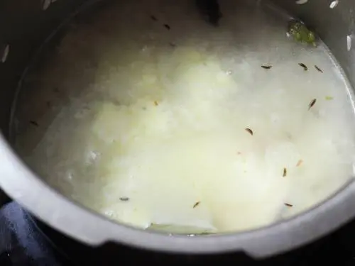 pour water and saffron infused milk