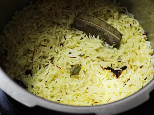 Kashmiri pulao in a pressure cooker