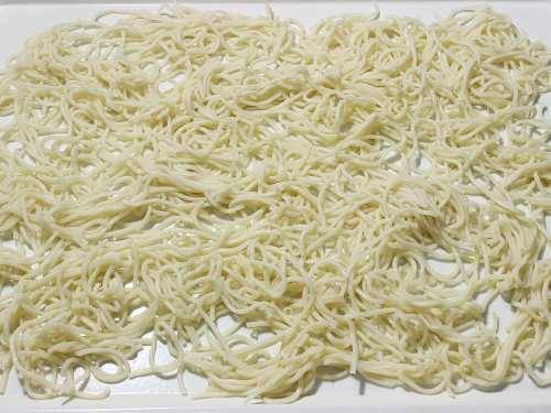 spread noodles on a tray