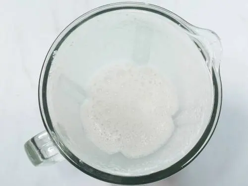 water and yogurt to make orange banana smoothie