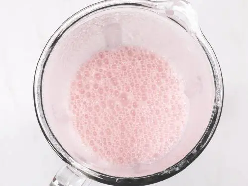 blended strawberries, nuts and milk