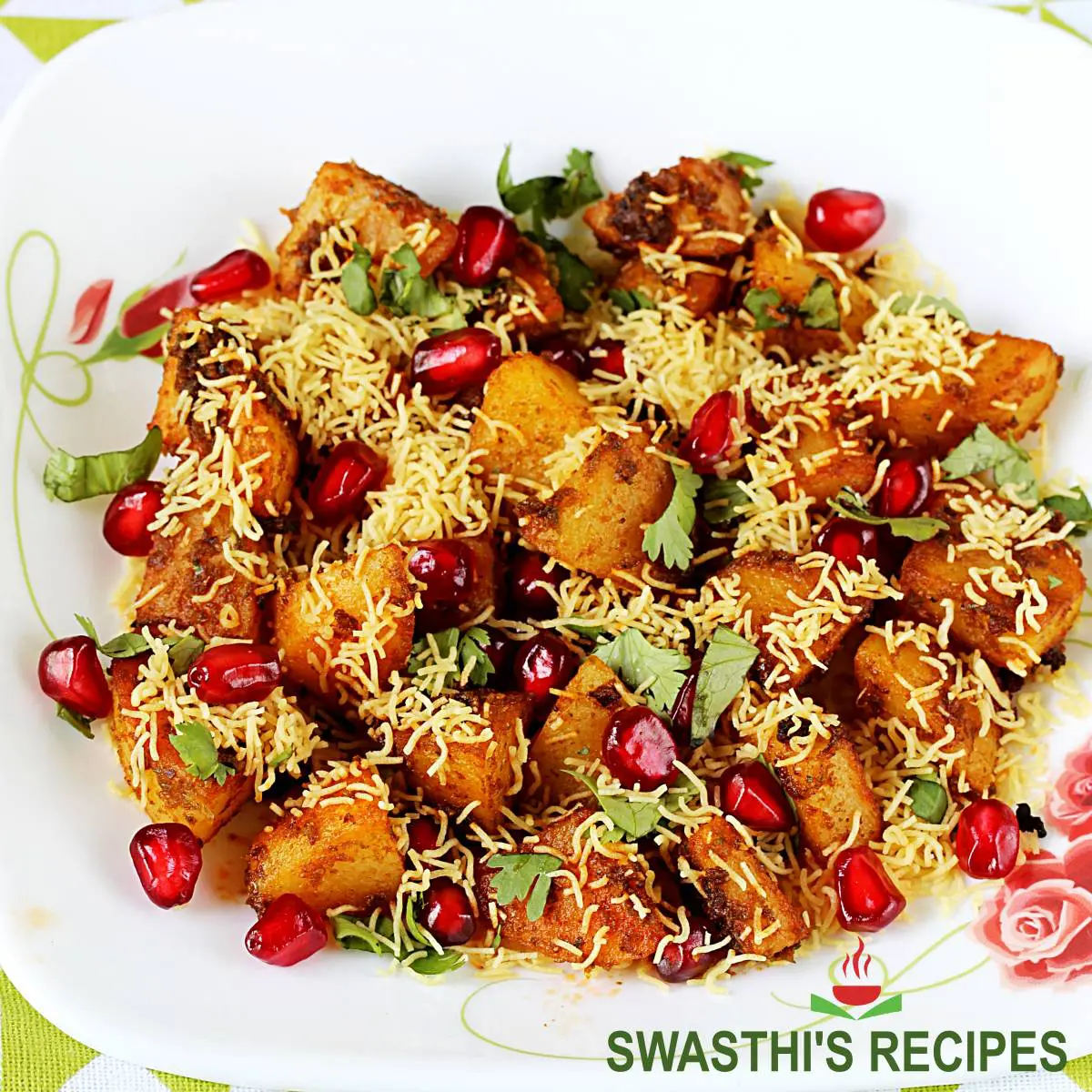 aloo chaat made with pan fried potatoes, ground spices and sev
