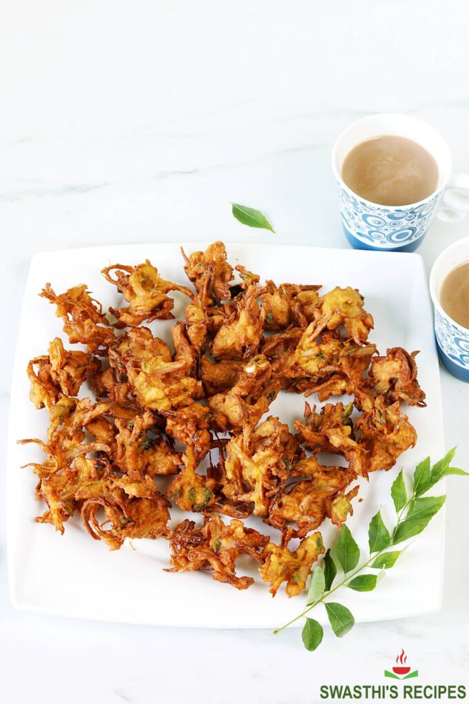onion pakoda served in a white plate