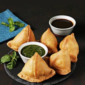 samosa stuffed with spiced potatoes, served with chutney
