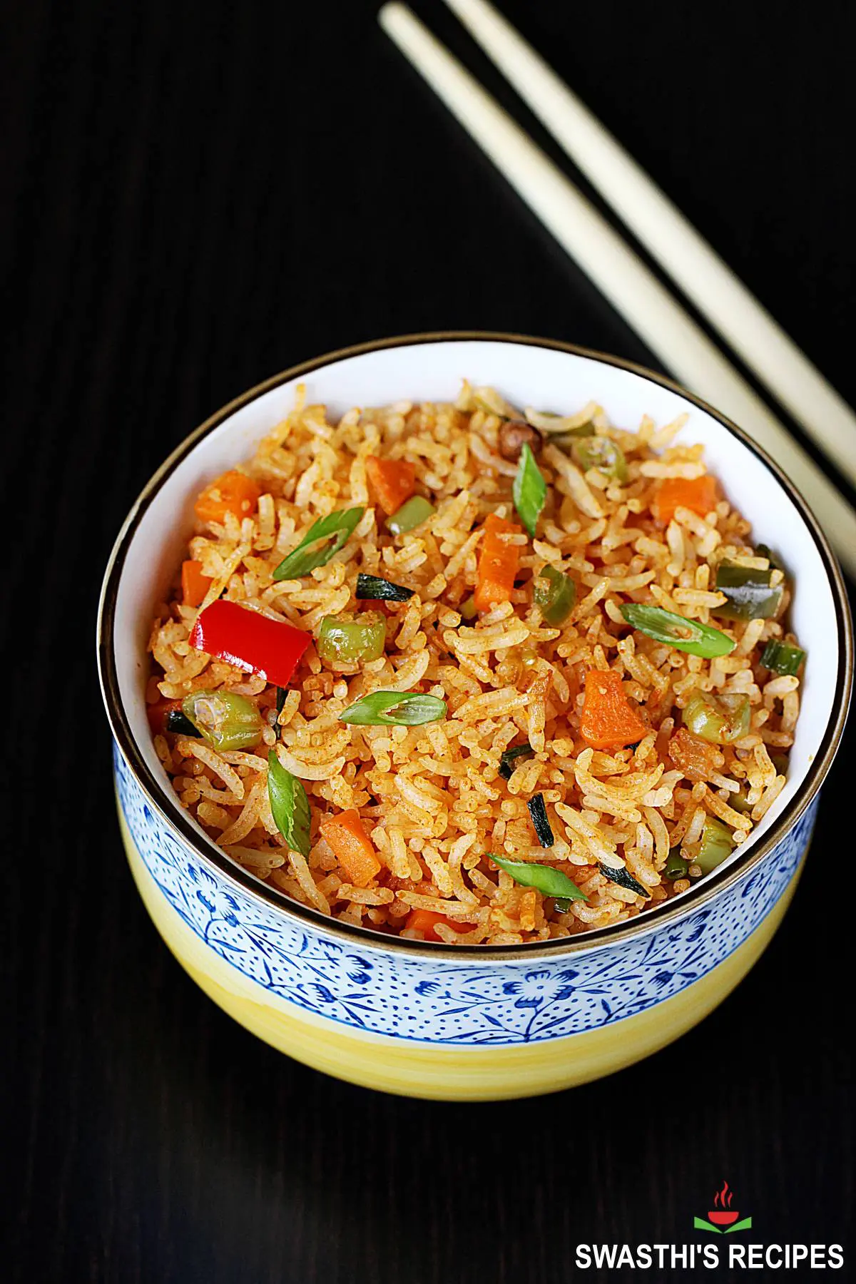 schezwan fried rice served in a white bowl