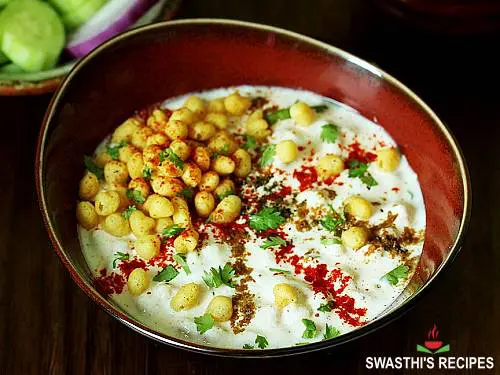 boondi raita served in a brown bowl