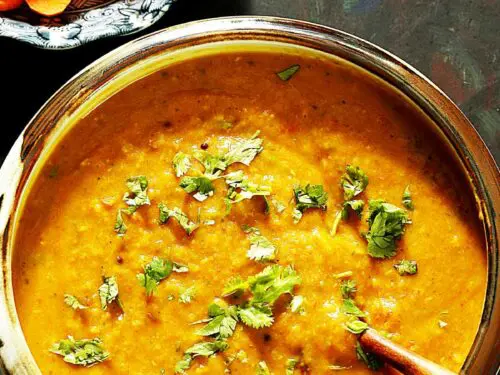 dal fry garnished with coriander leaves