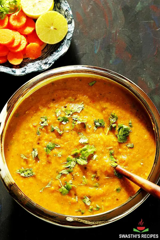 dal fry garnished with coriander leaves