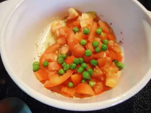 chopped tomatoes and peas to make dum aloo