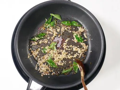 spread tempered spices all over the pan