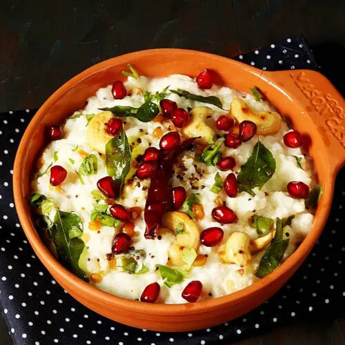 curd rice served in a terracotta bowl