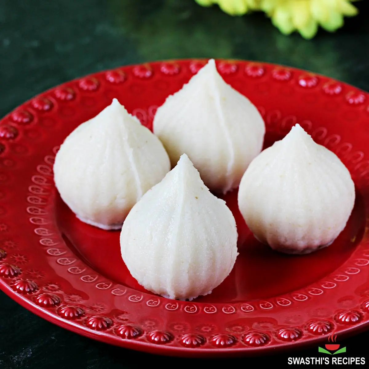 rava modak offered in a red plate
