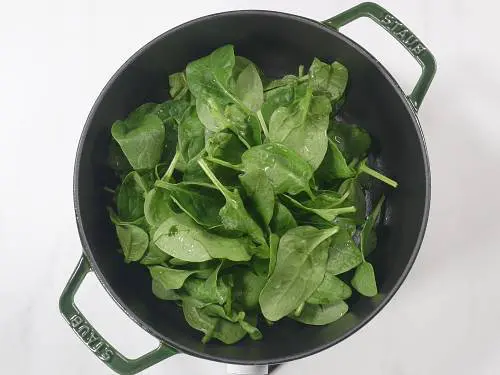 spinach in a pot to make soup