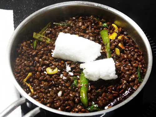 add coconut to the horse gram dal