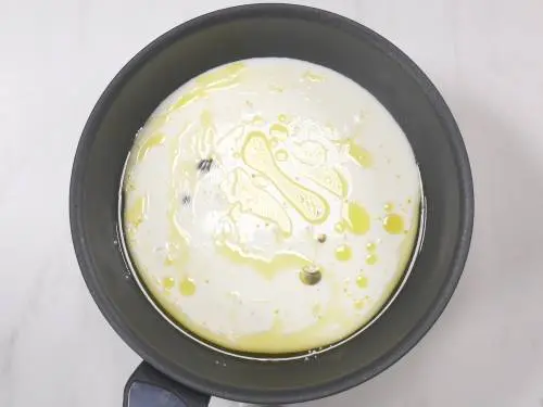 milk and ghee in a pan