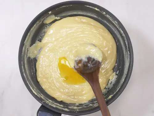 add ghee to milk powder mixture