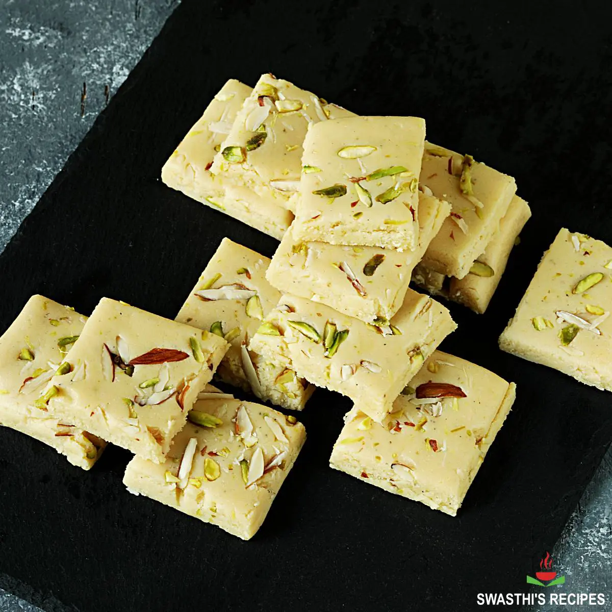 Milk powder burfi made with dry milk powder sugar and milk