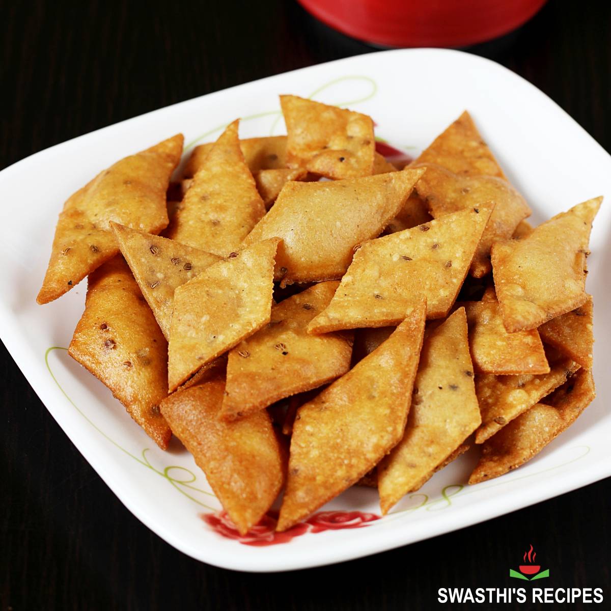 Namak para also known as spicy diamond cuts served in a plate